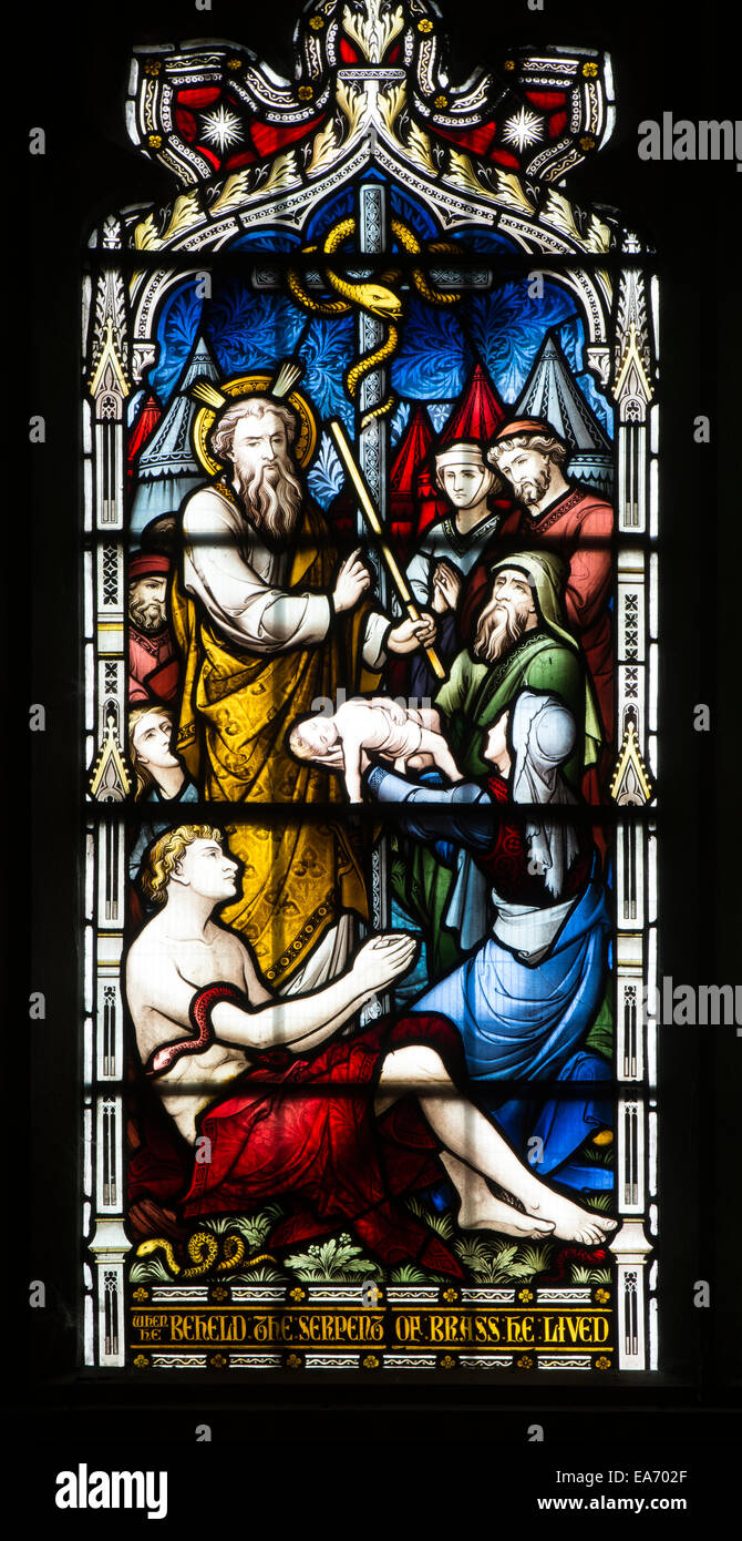 Moses and the brass serpent stained glass, St. Mark`s Church, Leamington Spa, UK Stock Photo